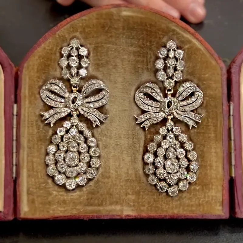 7.0 Carat Luxurious Vintage Round Cut White Gemstone Bow Earrings